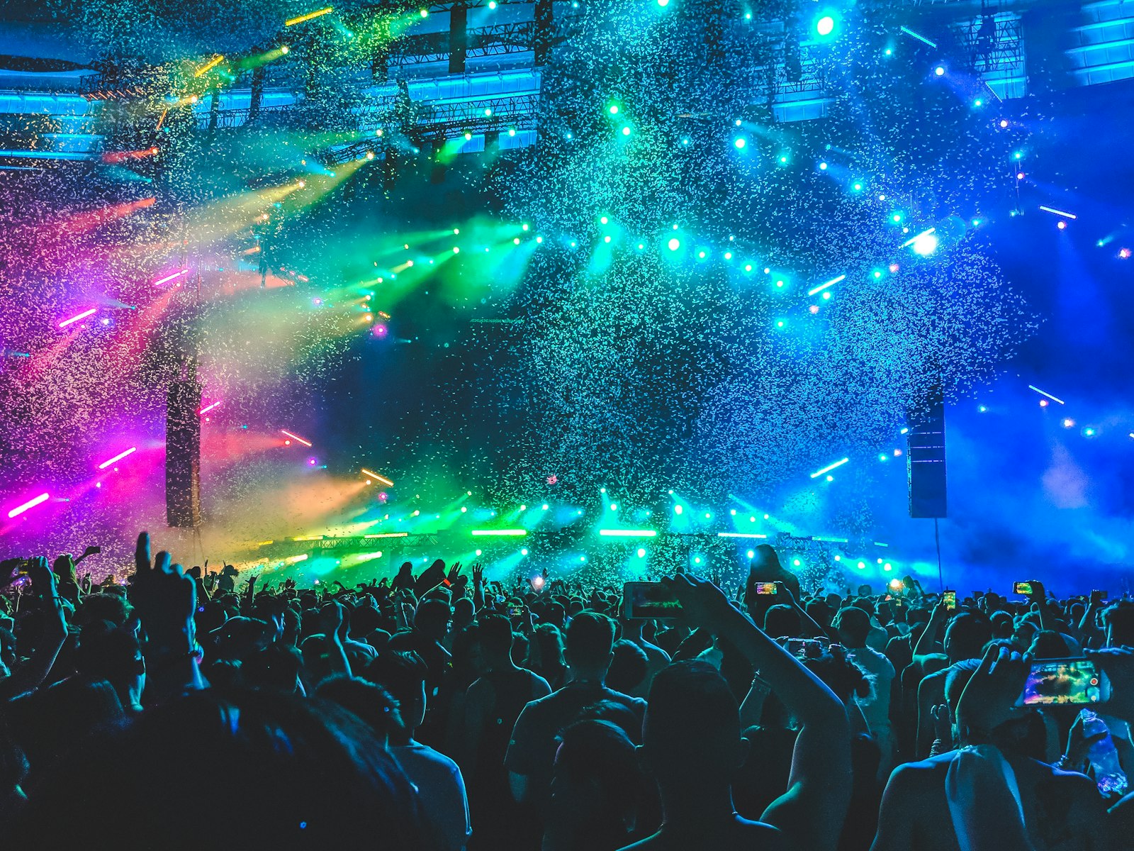 Confetti falling over a summer concert stage