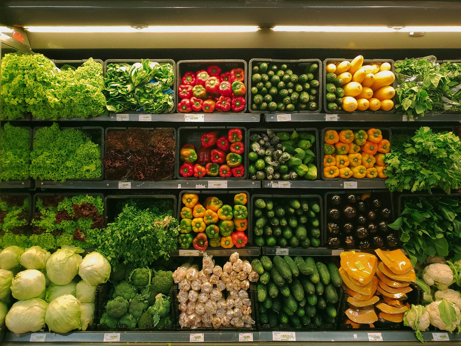 Market shelves stacked with fresh local goods