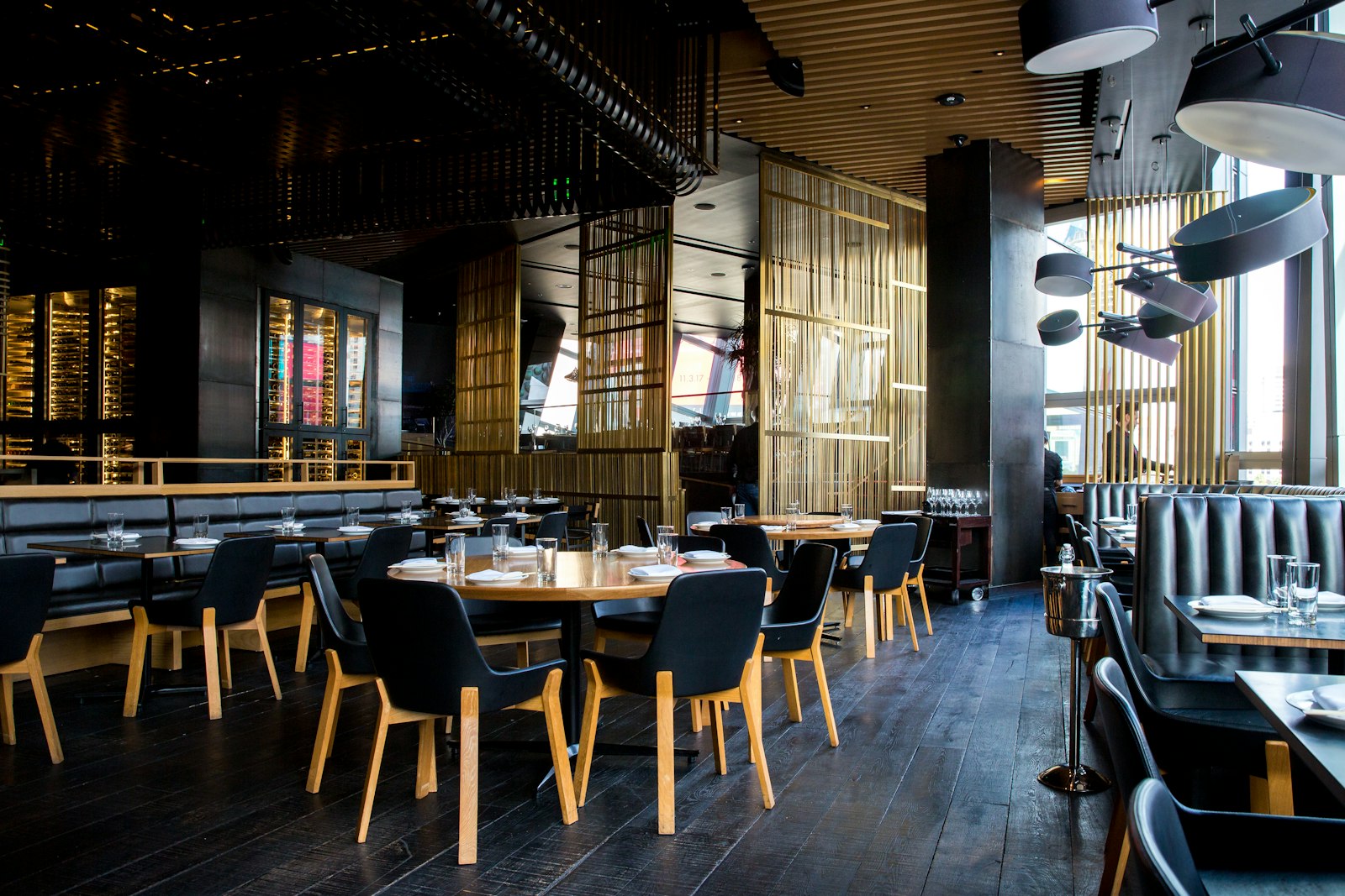 A moody, stylish bar and dining room