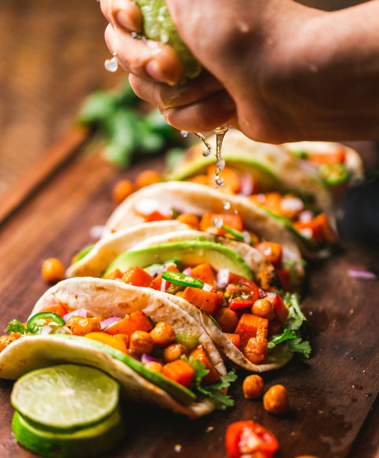 Fresh tacos topped with salsa and avocado